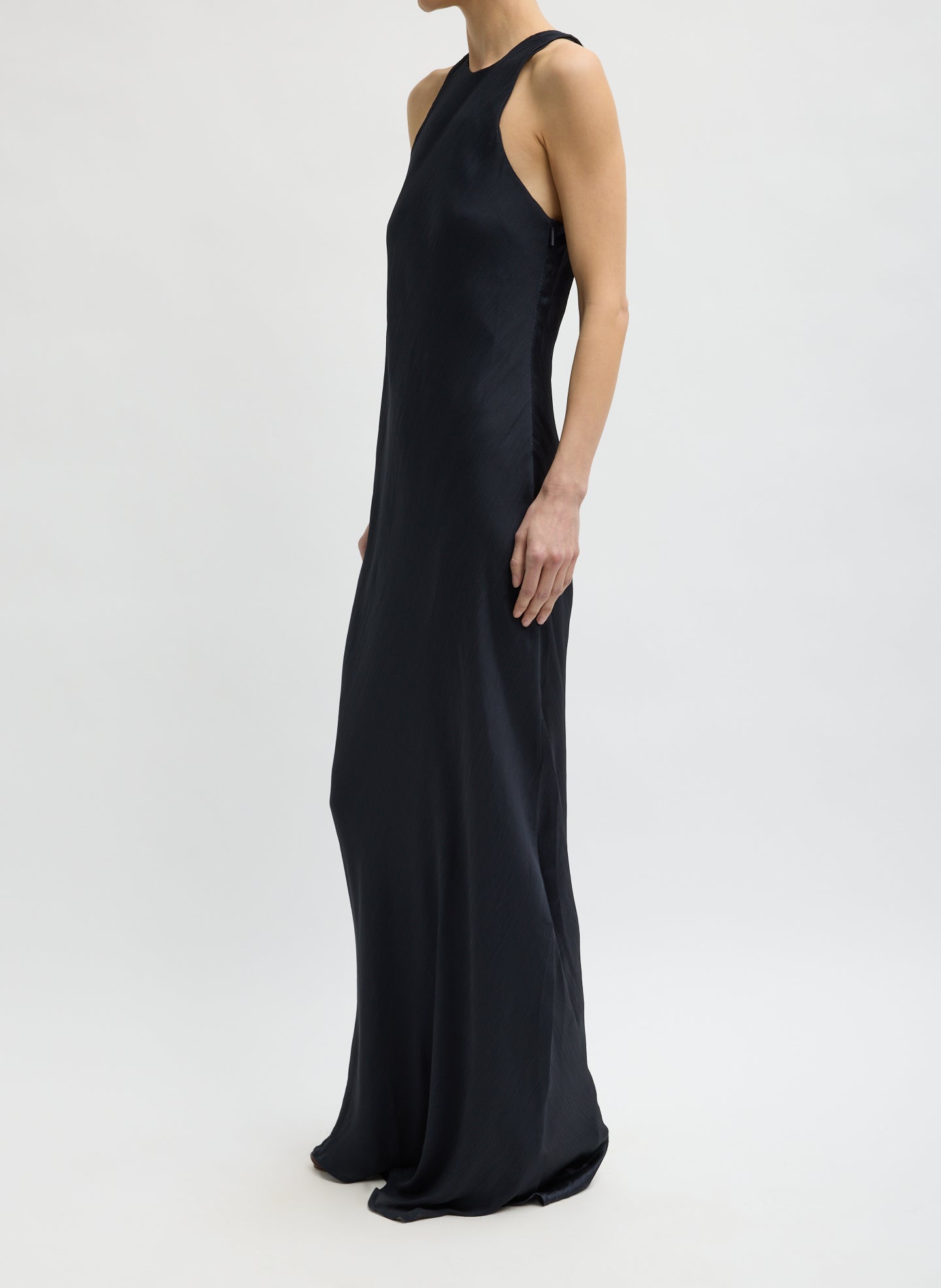 Navy Matte Satin Plisse Maxi Bias Dress - side view on model