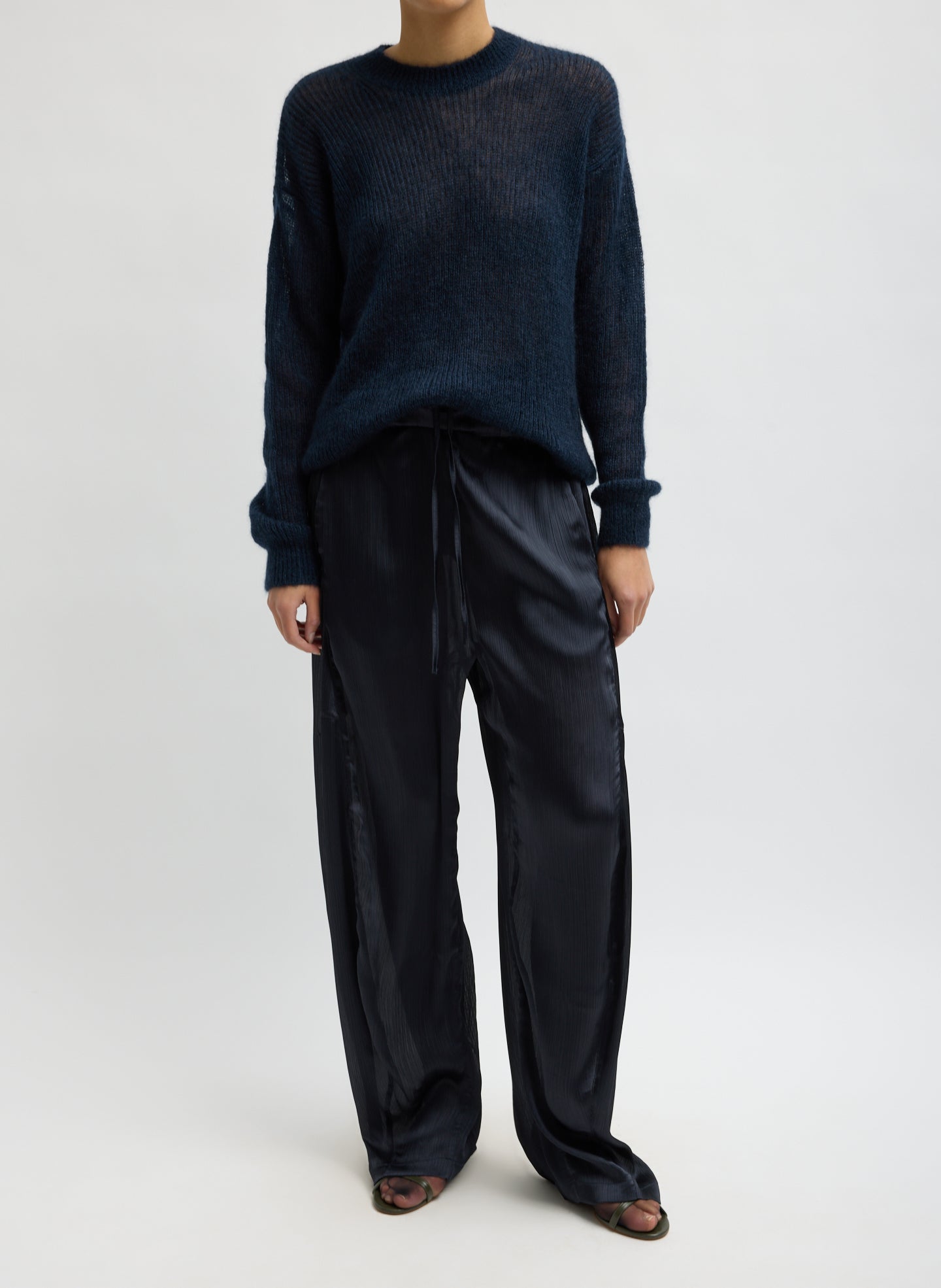 Navy Matte Satin Plisse Winslow Pant - barrel leg satin pant, front view on model