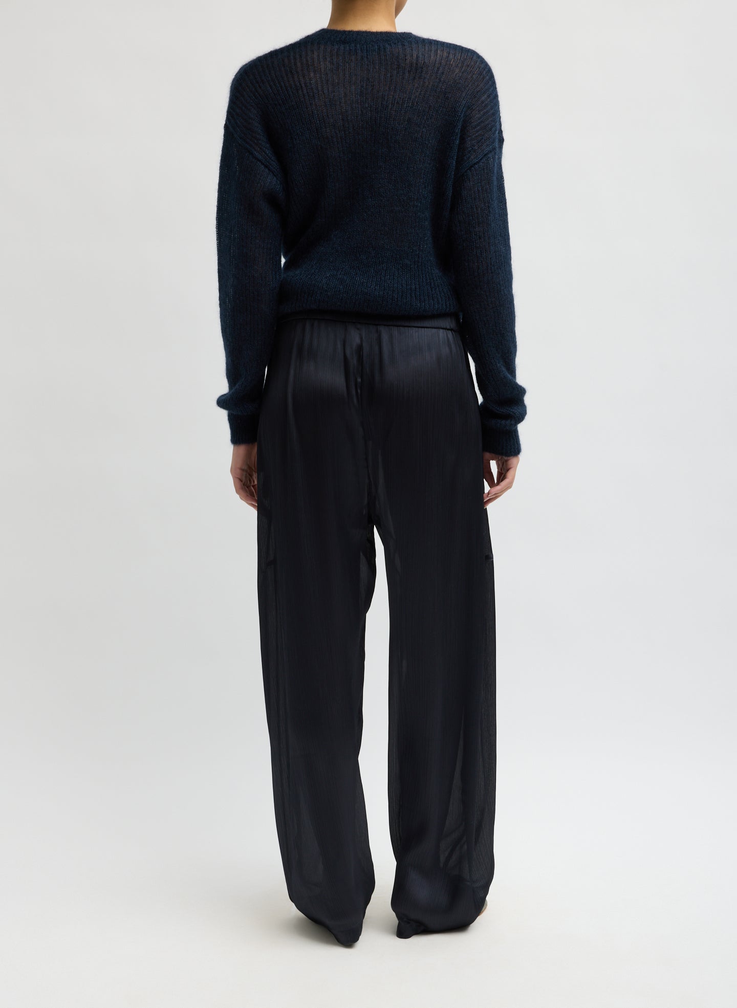 Navy Matte Satin Plisse Winslow Pant - barrel leg satin pant, back view on model