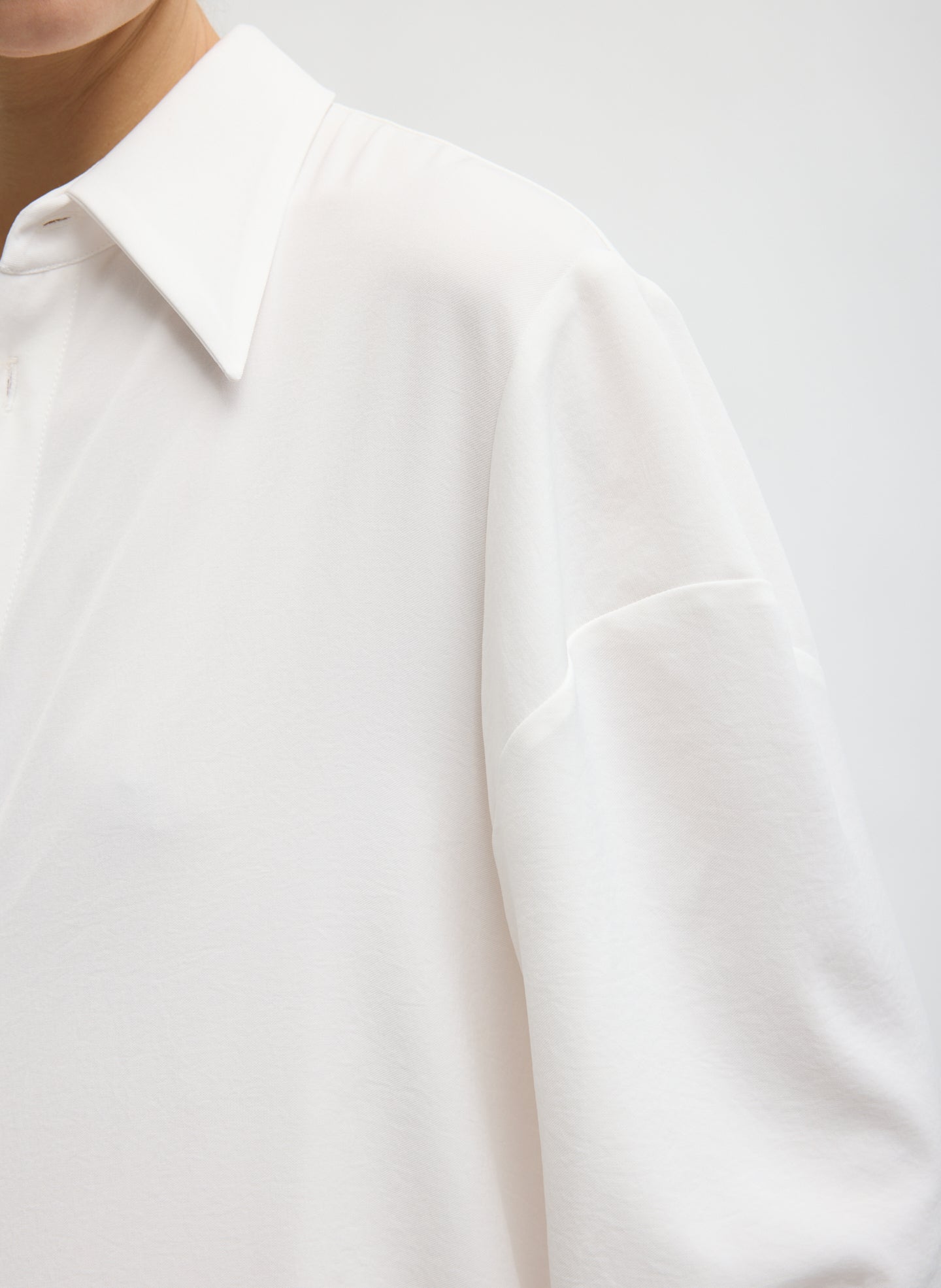 Ivory Soft Drape Hinged Shirt - closeup of hinged shoulder detail