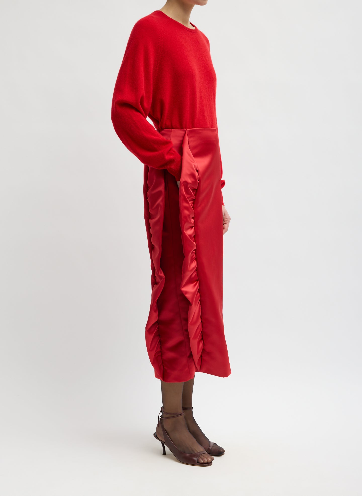 Red Tech Satin Side Ruffle Skirt - midi skirt, side view on model