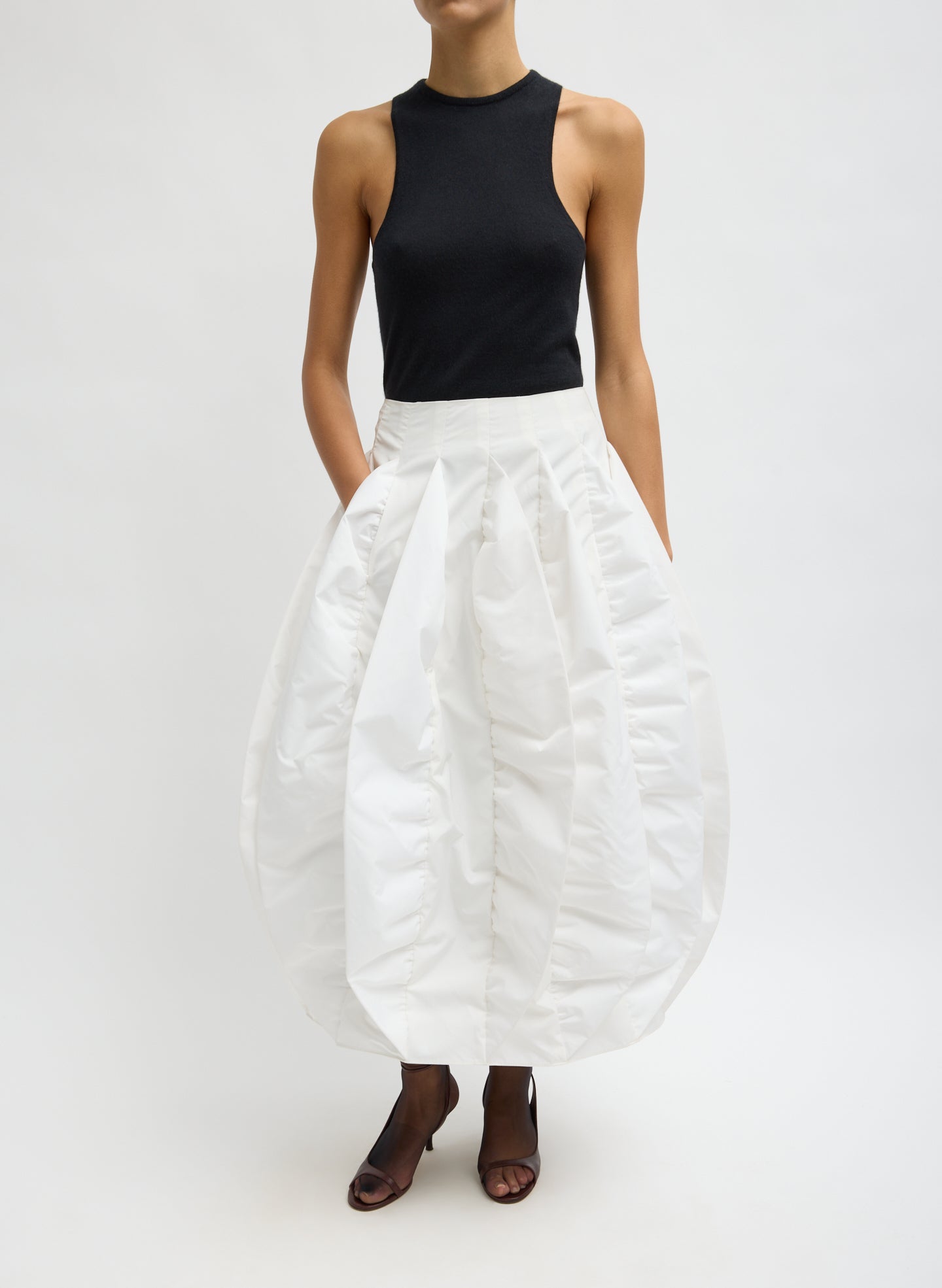 White Recycled Italian Sporty Nylon Skirt - pleated bubble midi skirt, front view on model