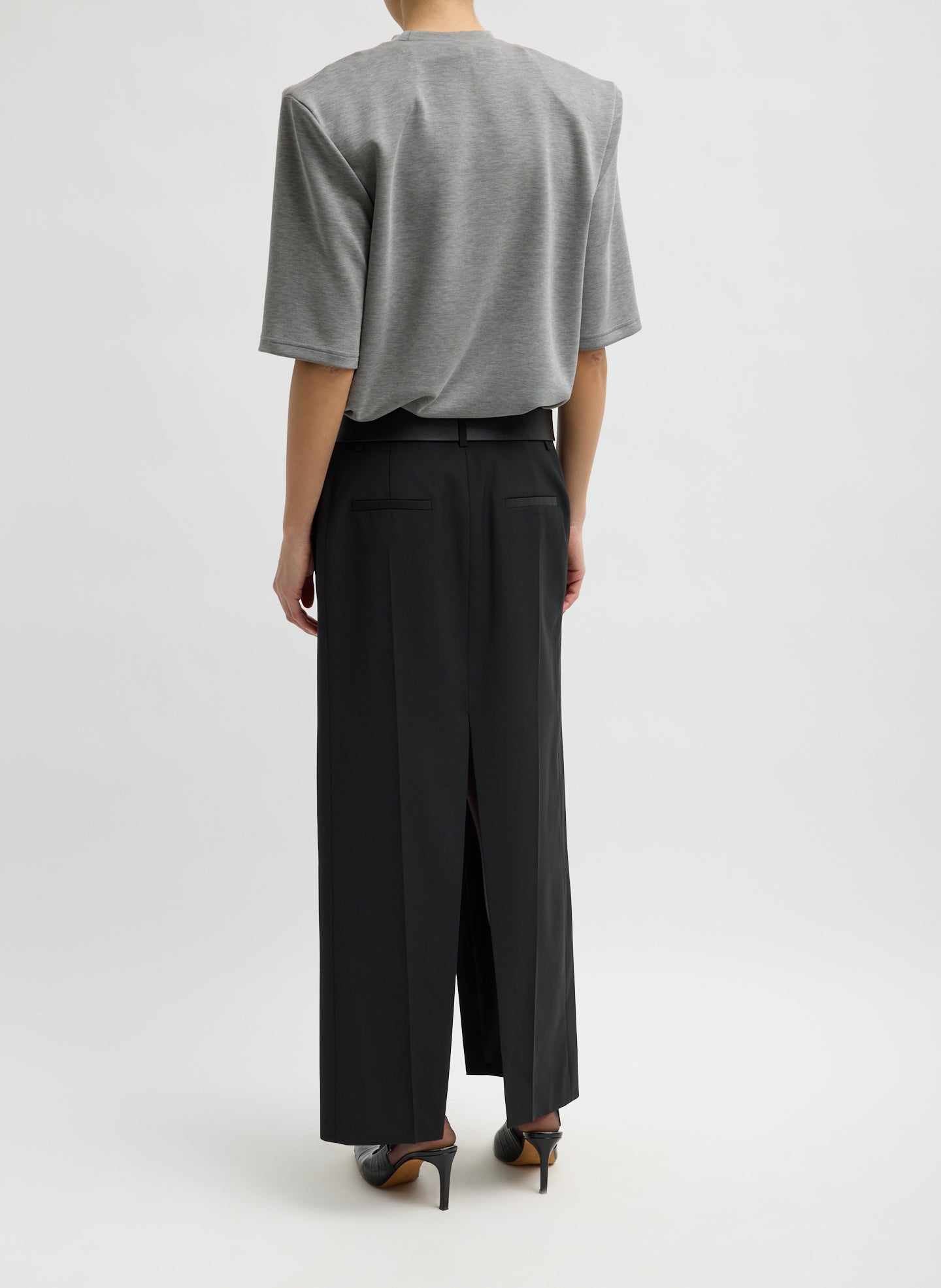 Black Recycled Tropical Wool Double Slit Maxi Skirt - maxi trouser skirt with front slit, back view on model