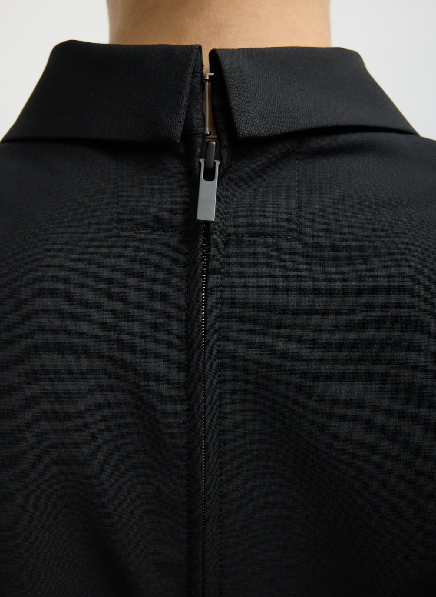 Black Recycled Tropical Wool Tuxedo Zip Blazer - closeup of back zip detail