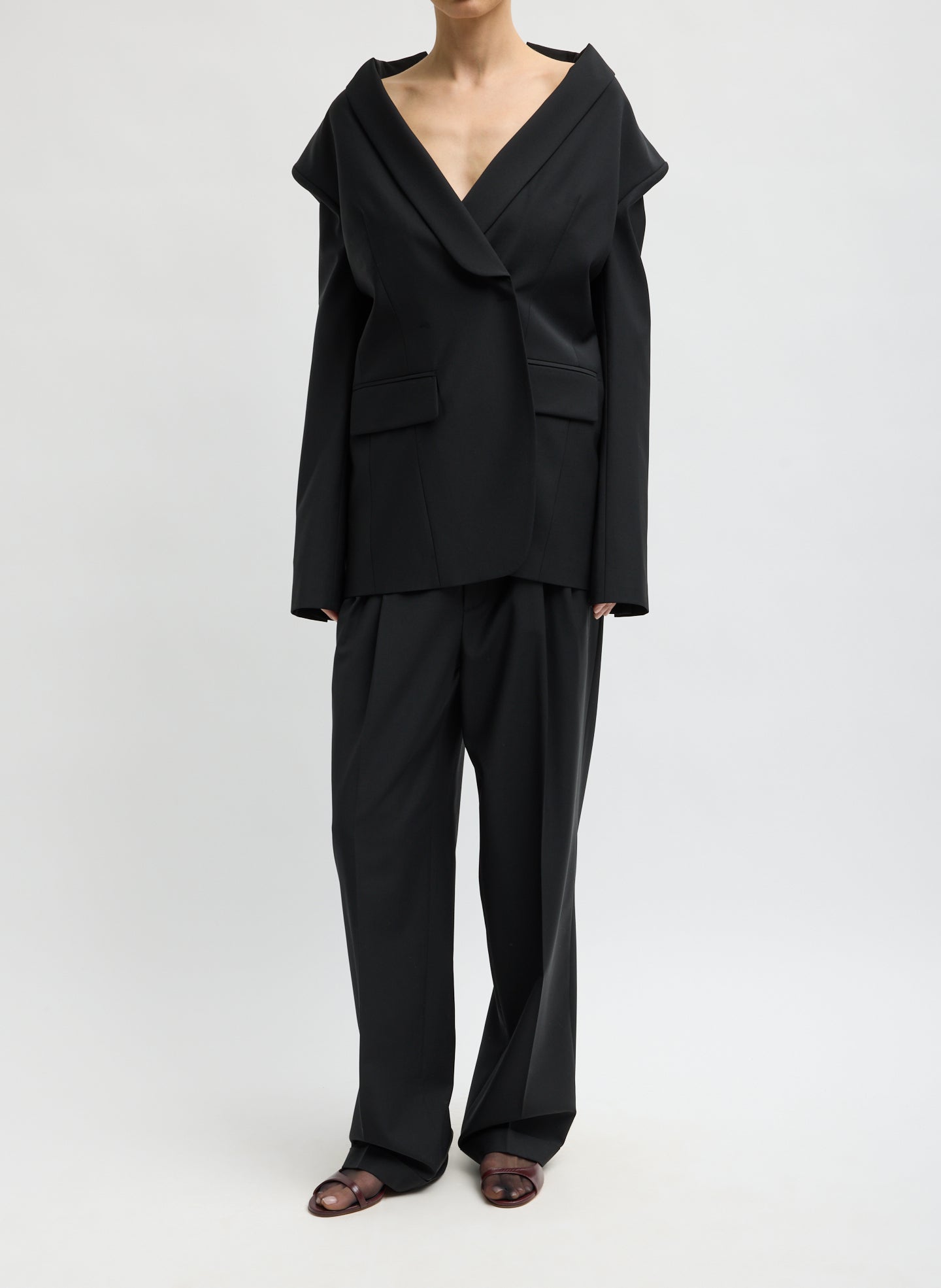 Black Recycled Tropical Wool Tuxedo Zip Blazer - front view on model