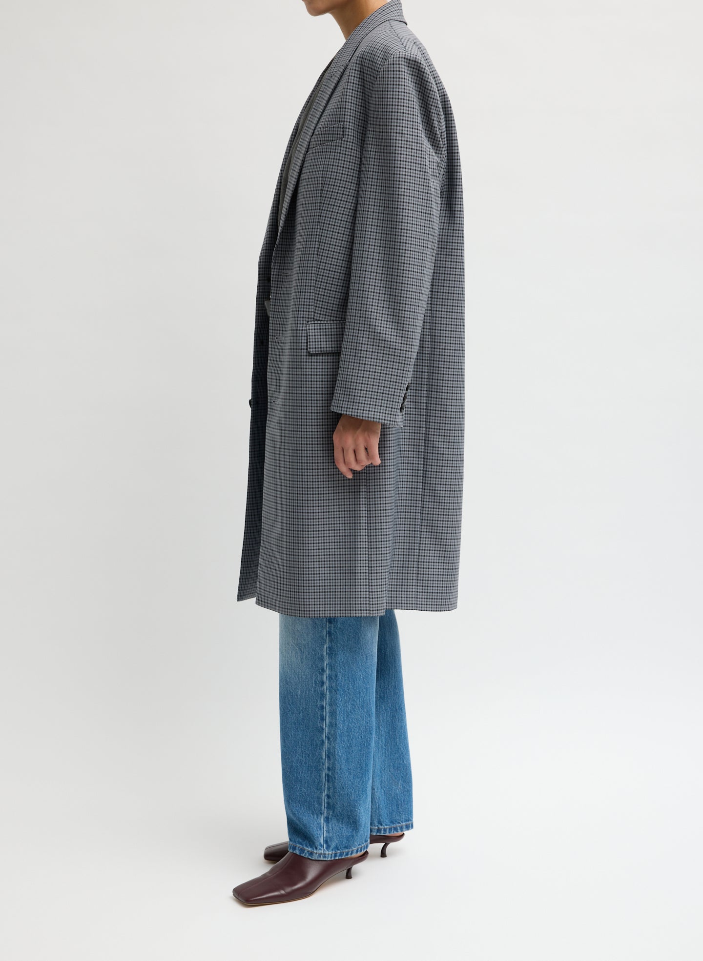 Grey Menswear Tech Twill Tailored Men's Midi Coat - side view on model