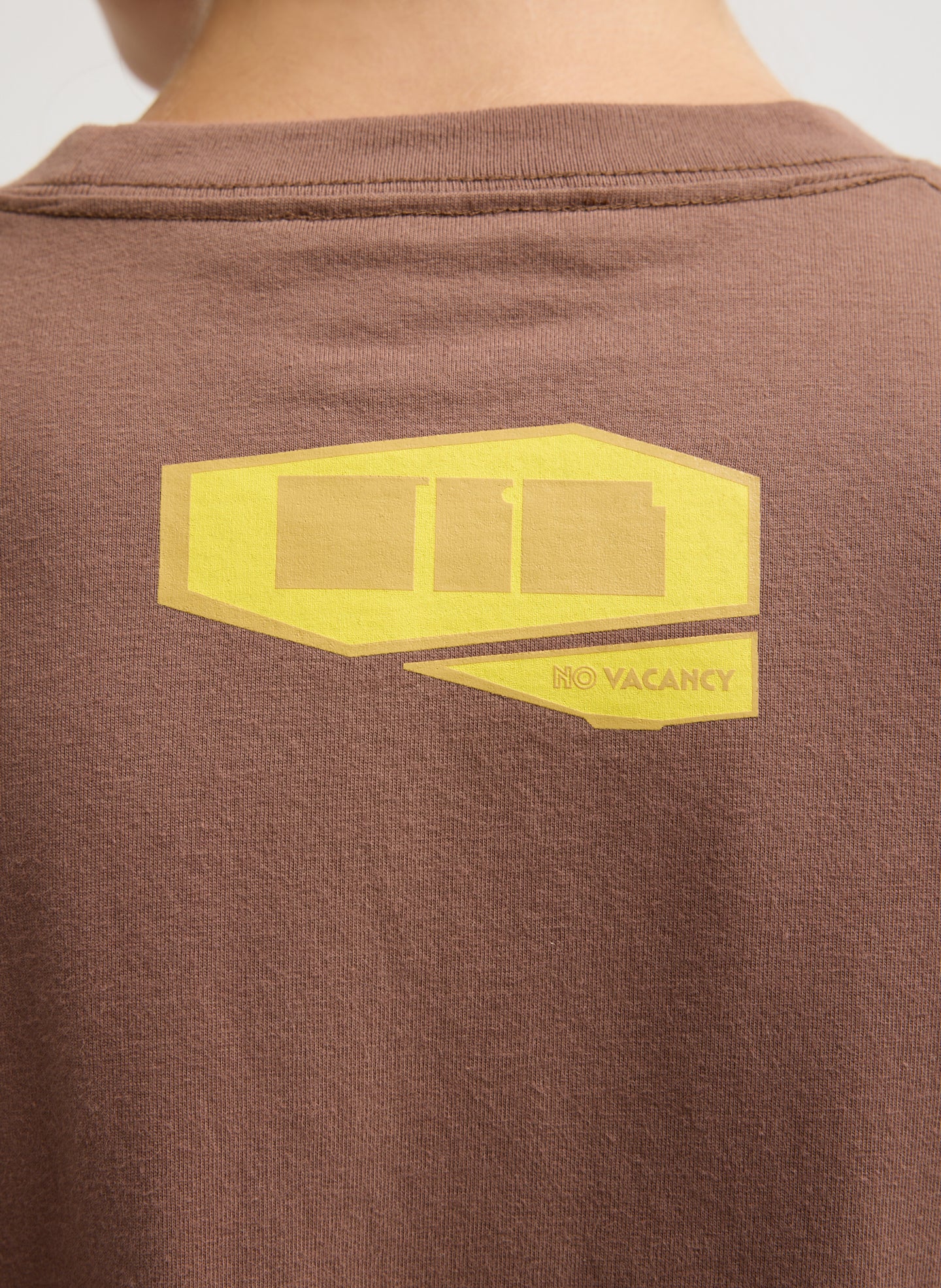 Tibi Creative Lab Motel T-Shirt- close up of back TCL logo 