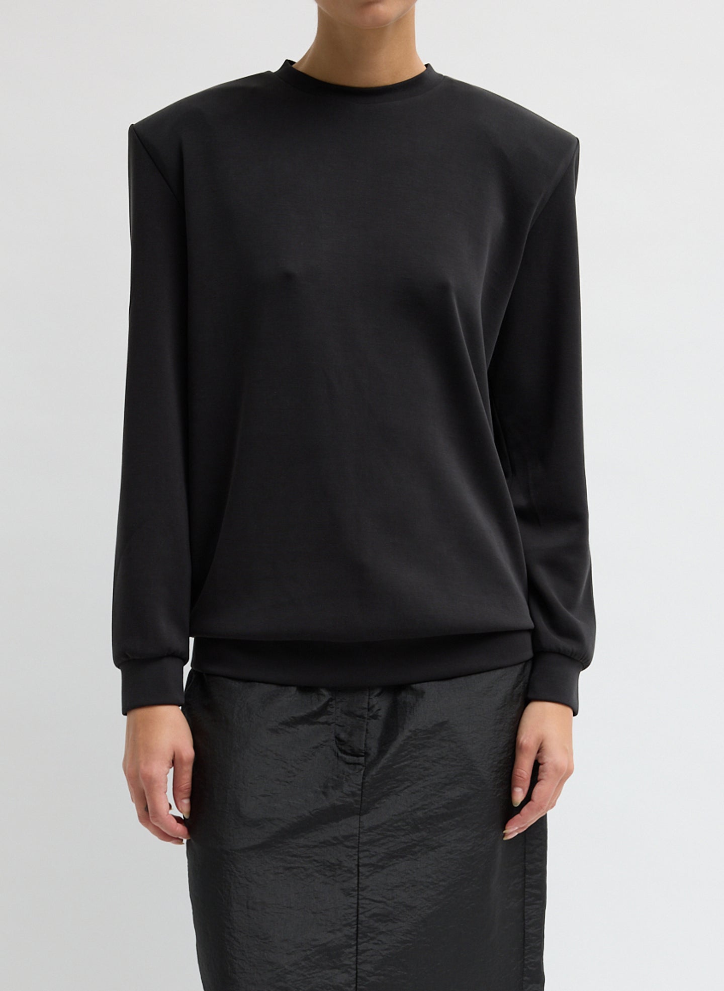 Black Feather Weight Viscose Removable Shoulder Pad Long Sleeve T-Shirt - front view on model