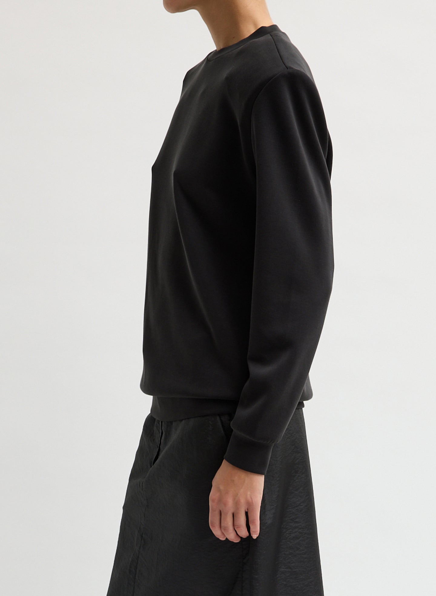 Black Feather Weight Viscose Removable Shoulder Pad Long Sleeve T-Shirt - side view on model