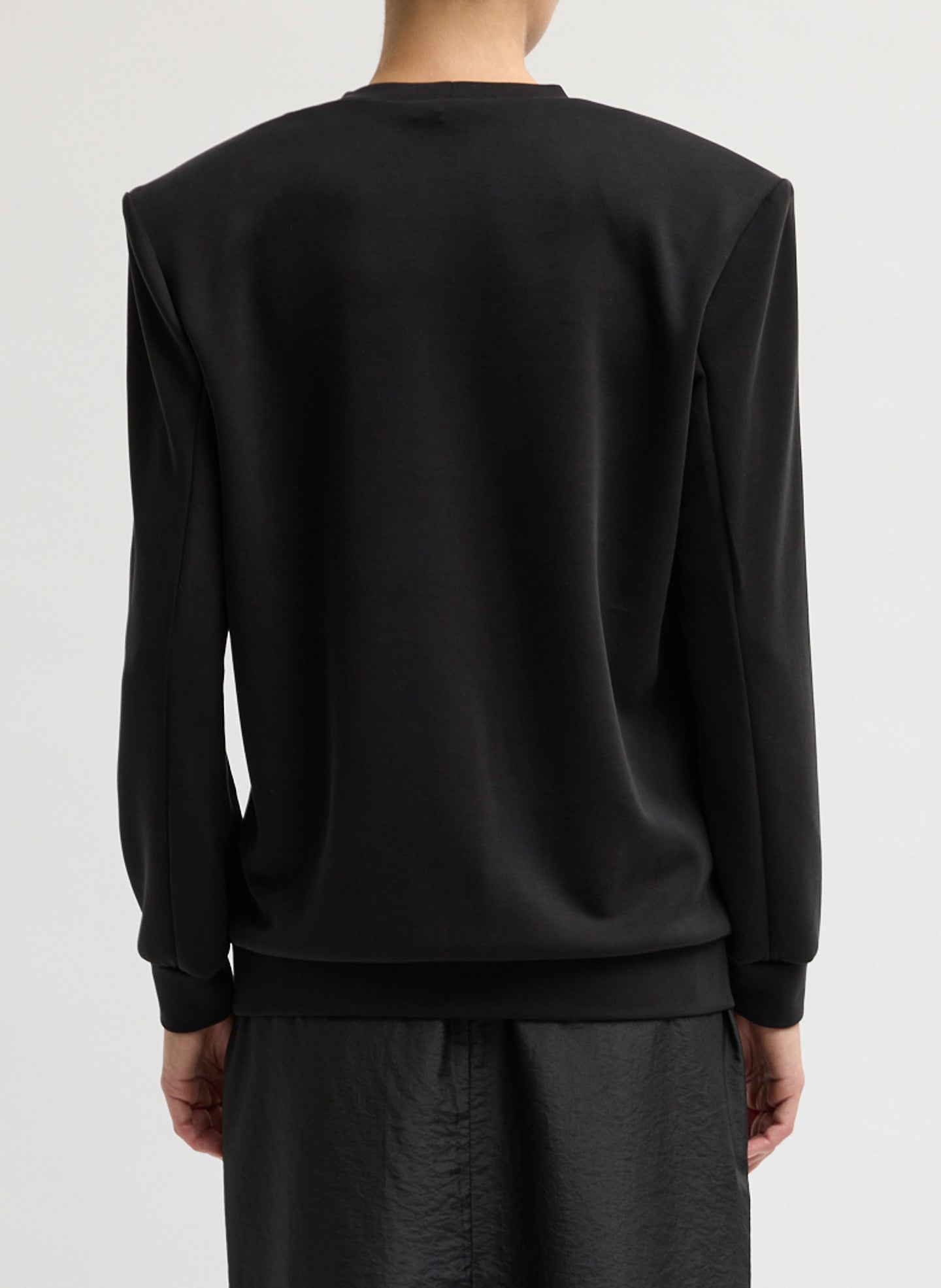 Black Feather Weight Viscose Removable Shoulder Pad Long Sleeve T-Shirt - back view on model