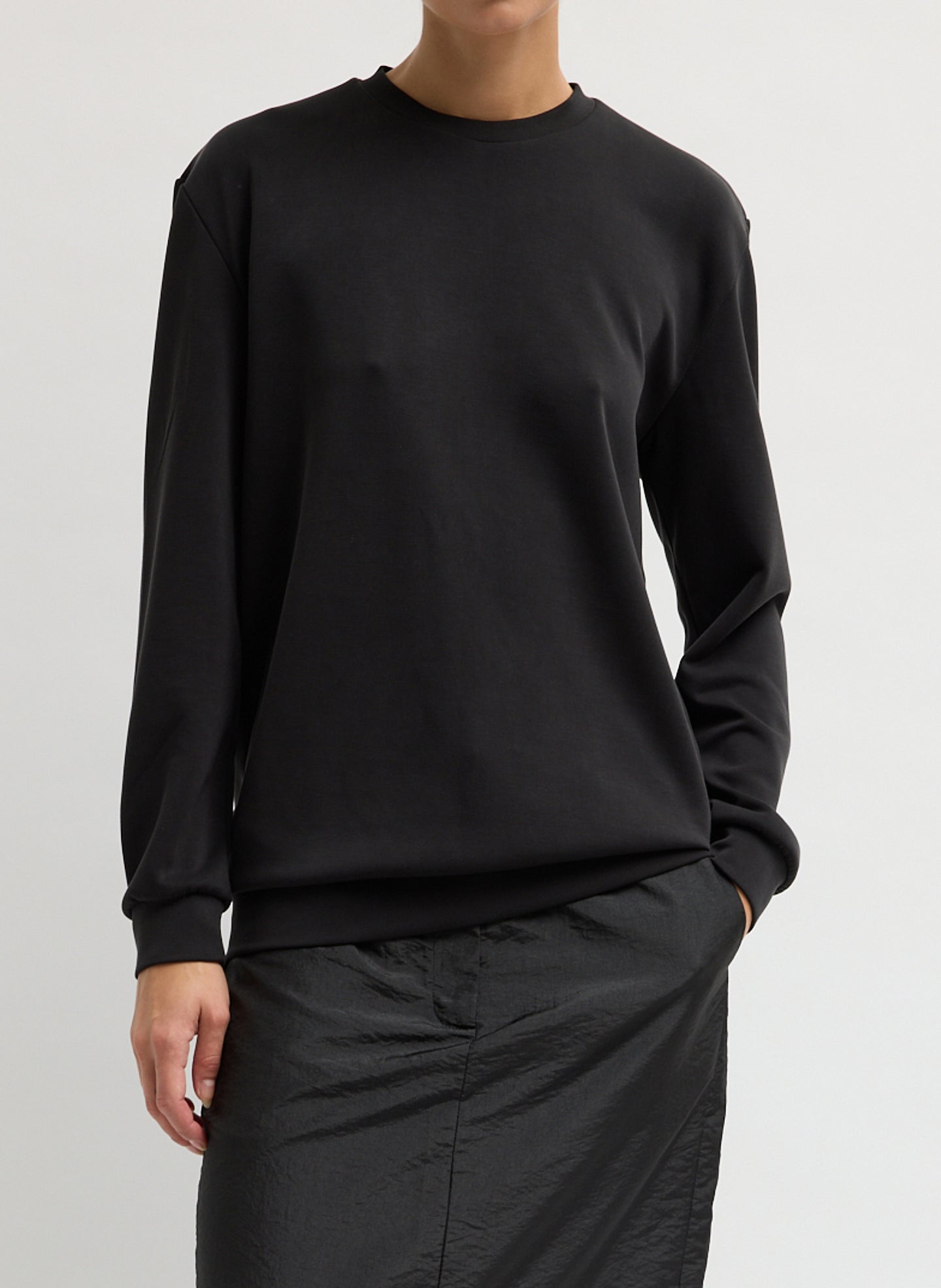 Black Feather Weight Viscose Removable Shoulder Pad Long Sleeve T-Shirt - front view on model