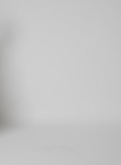 Model wearing White Compact Eco Poplin Pinched Pleat Dress - midi dress