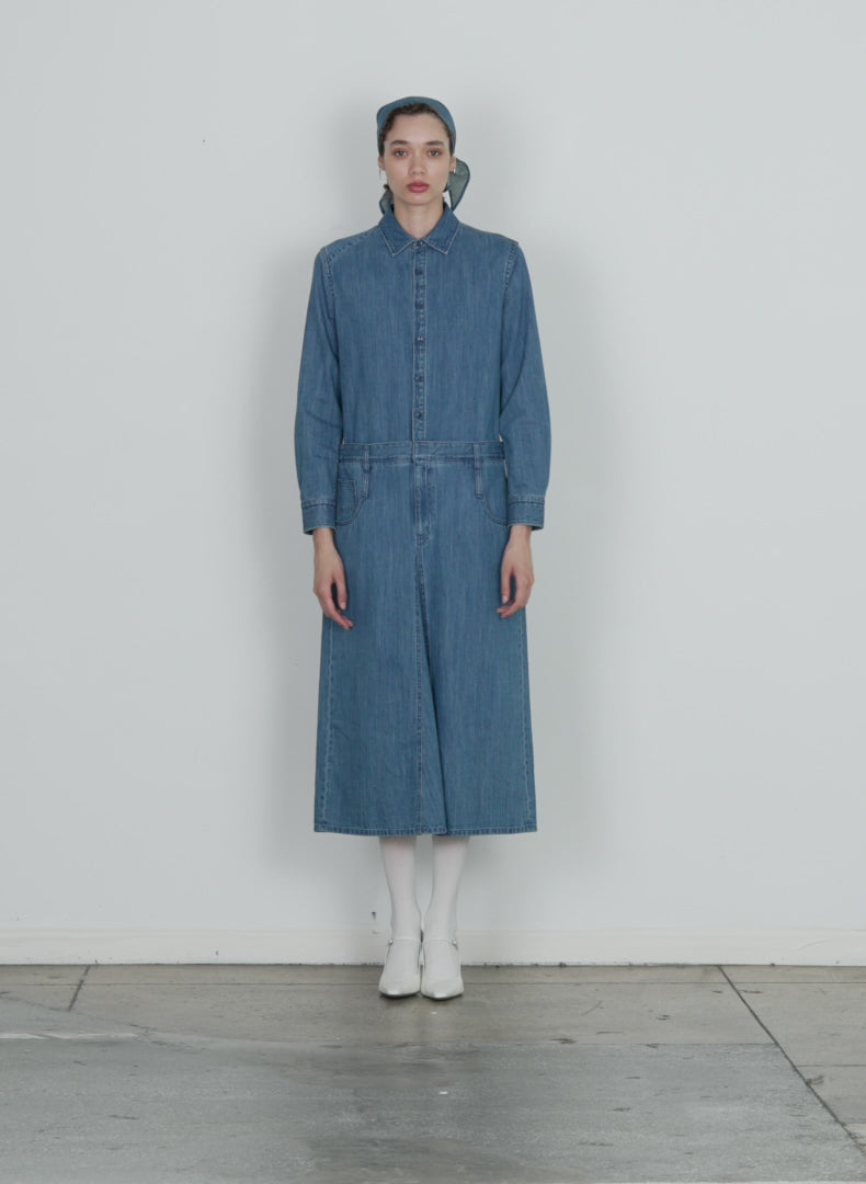 Model wearing the lightweight stone washed denim shirtdress denim blue 1 walking forward and turning around