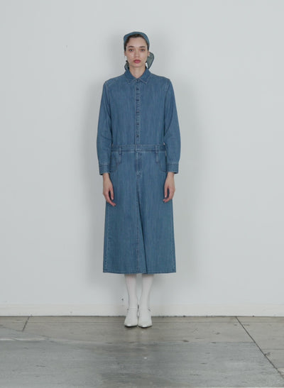 Model wearing the lightweight stone washed denim shirtdress denim blue 1 walking forward and turning around