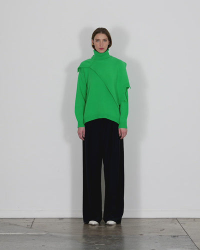 Model wearing the airy extrafine wool turtleneck dicky sweater walking forward and turning around