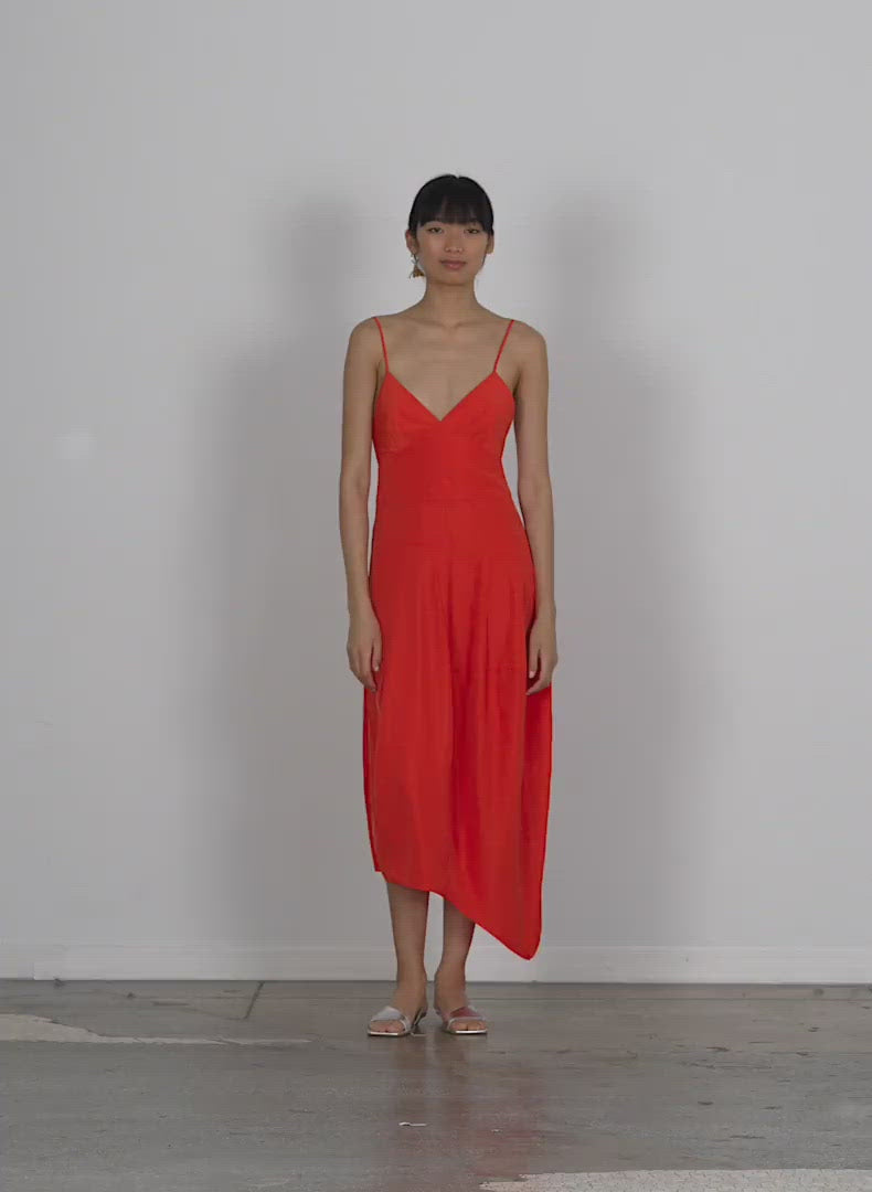 Model wearing the italian sporty nylon cami dress walking forward and turning around