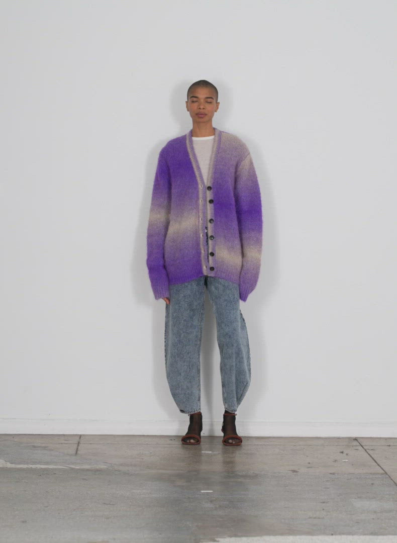 Model wearing the ombre superfine alpaca grandpa cardigan purple multi walking forward and turning around