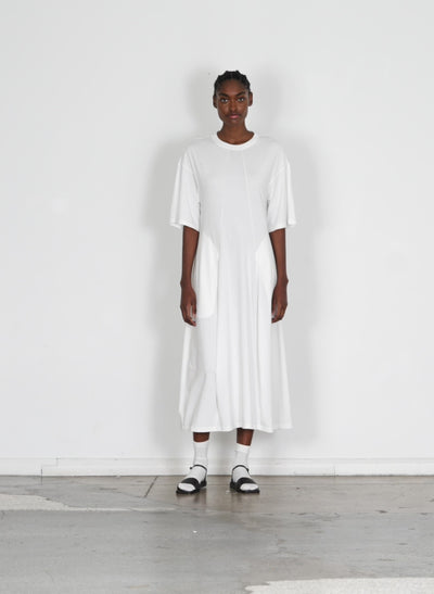 white t shirt and dress T-Shirt Dresses Are TrendingHere's How to Style Them back look thats both comfortable and stylish T-Shirt Dress Tibi Official