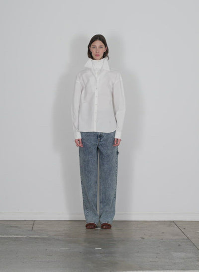 Model wearing the eco shirting double collar shirt white walking forward and turning around